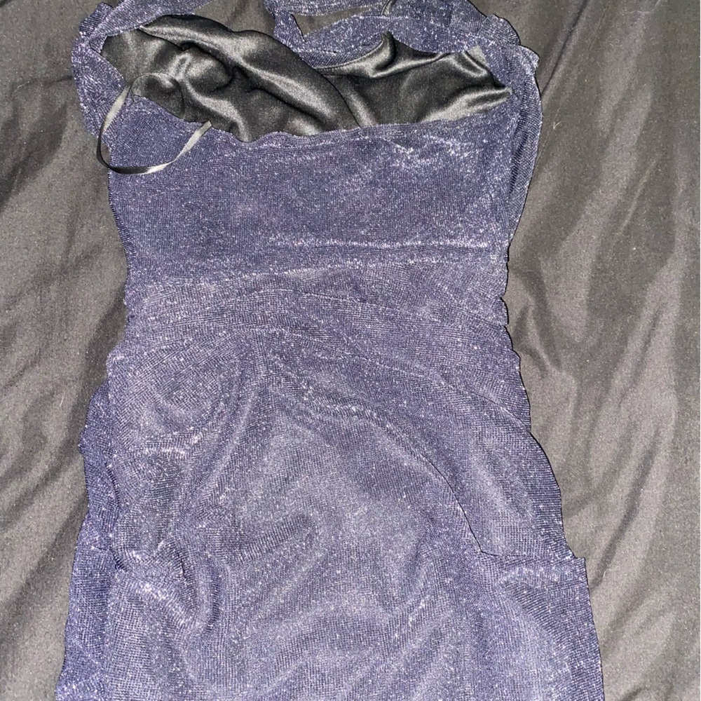 Shimmery black tight holter top dress. Super cute never worn still has tags